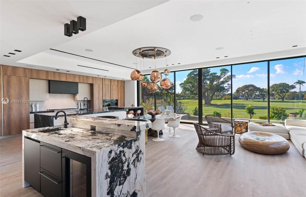 The Modern House in Miami Beach is a newly built tropical residence offering expansive western views of the La Gorce Country Club Golf Course now available for sale. This home located at 5470 La Gorce Dr, Miami Beach, Florida; offering 4 bedrooms and 4 bathrooms with over 3,600 square feet of living spaces.
