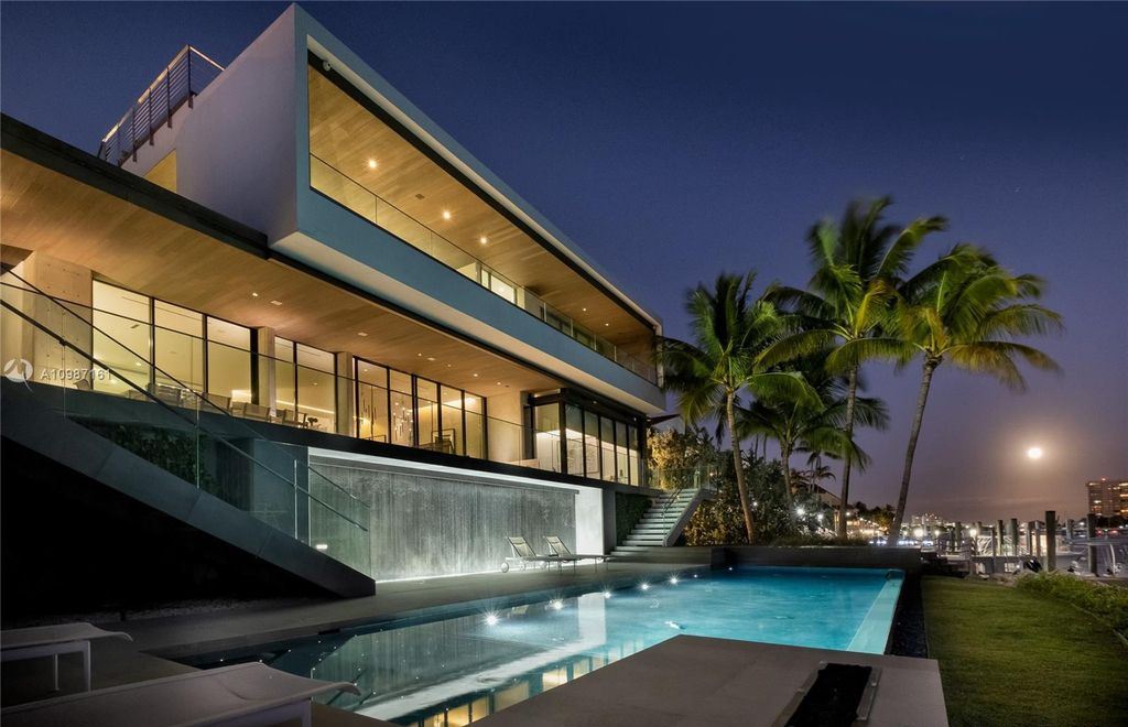 The Miami Waterfront Home is a sensational Biscayne Bay estate boasts open Bay Views now available for sale. This home located at 3591 Rockerman Rd, Miami, Florida; offering 5 bedrooms and 5 bathrooms with over 7,700 square feet of living spaces.