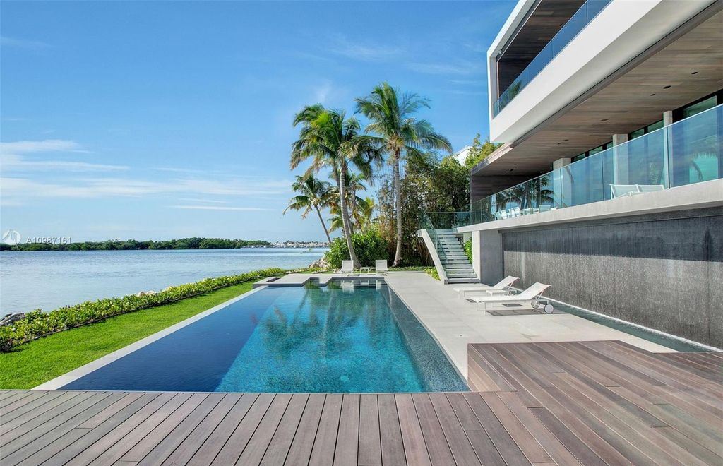 The Miami Waterfront Home is a sensational Biscayne Bay estate boasts open Bay Views now available for sale. This home located at 3591 Rockerman Rd, Miami, Florida; offering 5 bedrooms and 5 bathrooms with over 7,700 square feet of living spaces.