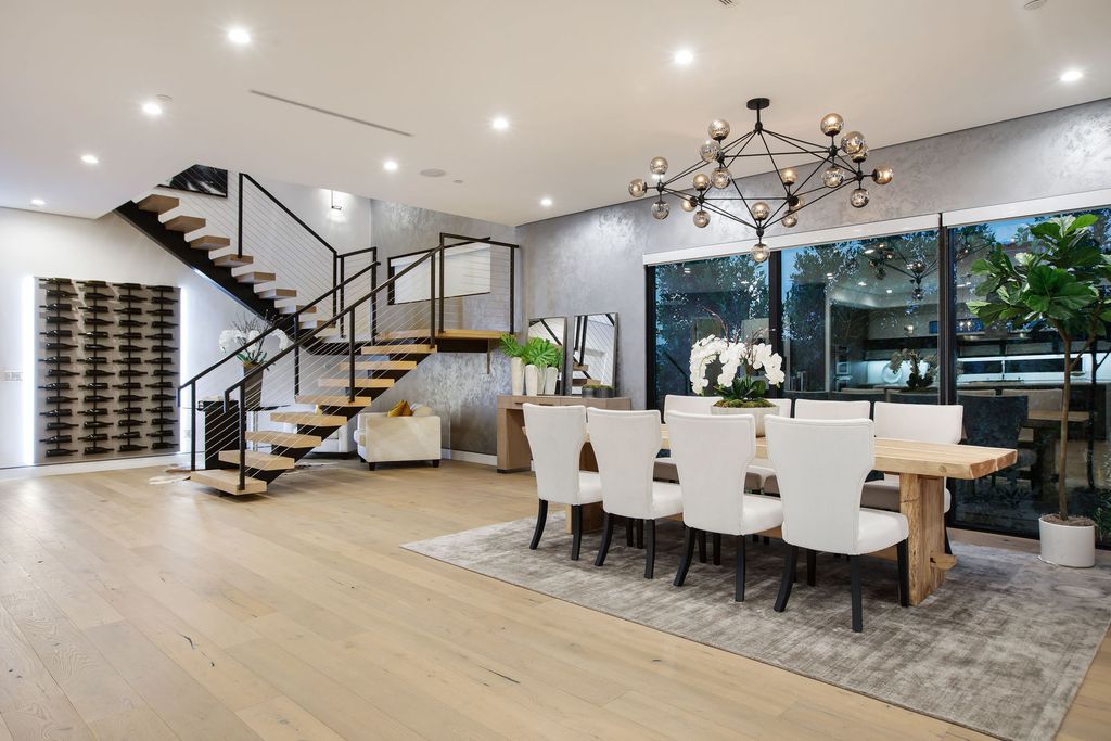 The Contemporary Modern Home in Los Angeles is a striking new construction in an unbeatable location now available for sale. This home located at 7952 W 4th St, Los Angeles, California; offering 5 bedrooms and 6 bathrooms with over 4,800 square feet of living spaces.