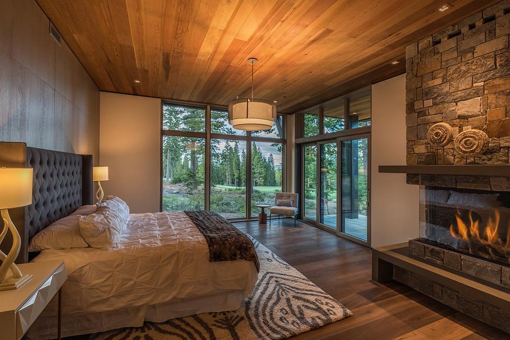 Martis Camp Home Lot 53 in Truckee, California was designed by Dennis Zirbel Architects in mountain contemporary style; this house offers impressive mountain views and expansive indoors and outdoors entertaining.