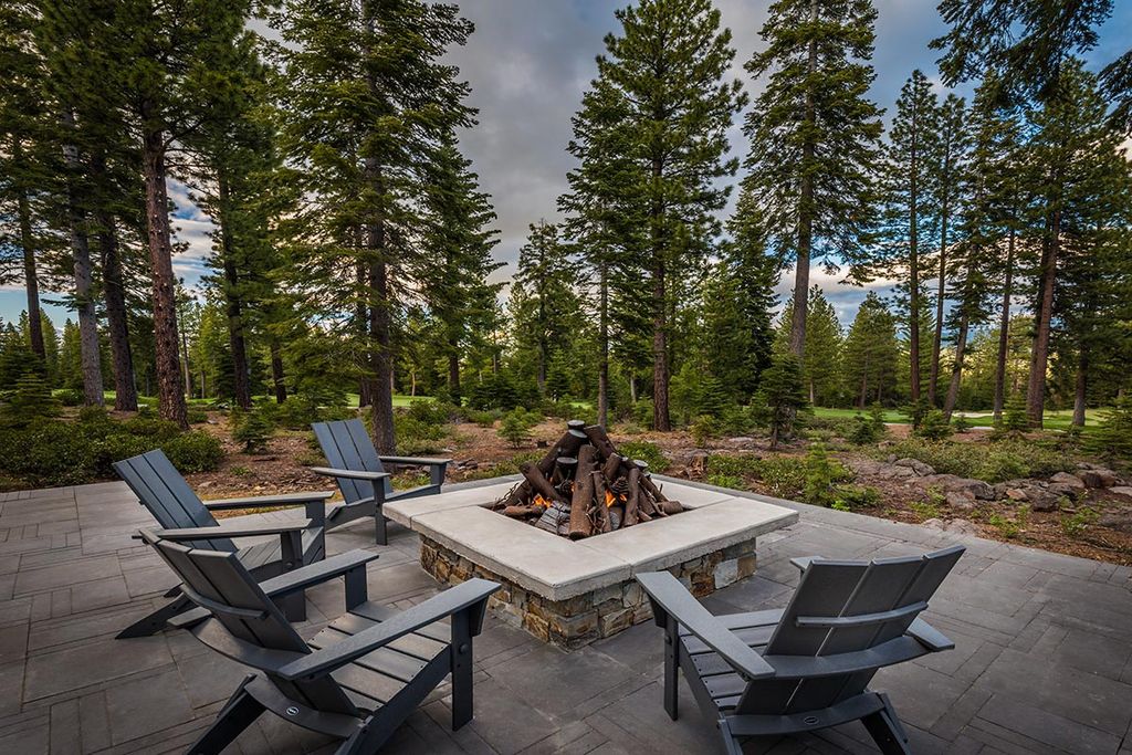 Martis Camp Home Lot 53 in Truckee, California was designed by Dennis Zirbel Architects in mountain contemporary style; this house offers impressive mountain views and expansive indoors and outdoors entertaining.