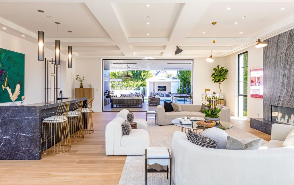 The Ultimate Entertainers Dream Home in Beverly Hills is a brand new Hamptons-inspired modern estate now available for sale. This home located at 632 N Palm Dr, Beverly Hills, California; offering 7 bedrooms and 12 bathrooms with over 13,500 square feet of living spaces.