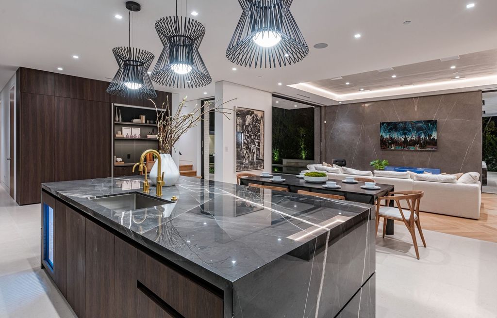 The Ultimate Entertainers Dream Home in Beverly Hills is a brand new Hamptons-inspired modern estate now available for sale. This home located at 632 N Palm Dr, Beverly Hills, California; offering 7 bedrooms and 12 bathrooms with over 13,500 square feet of living spaces.