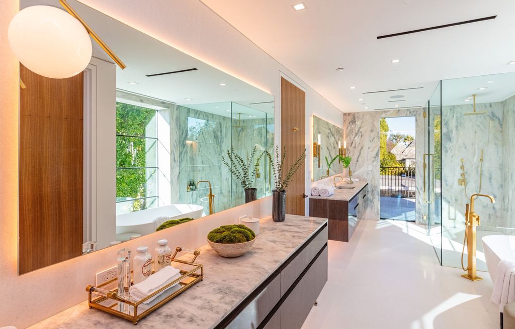 The Ultimate Entertainers Dream Home in Beverly Hills is a brand new Hamptons-inspired modern estate now available for sale. This home located at 632 N Palm Dr, Beverly Hills, California; offering 7 bedrooms and 12 bathrooms with over 13,500 square feet of living spaces.