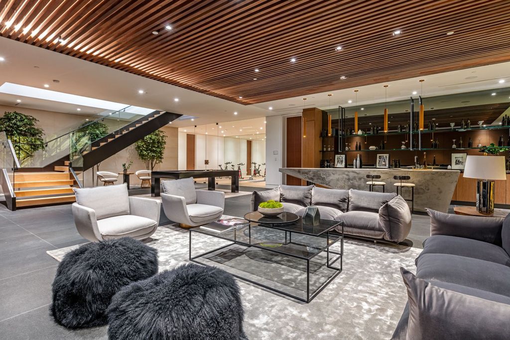 The Ultimate Entertainers Dream Home in Beverly Hills is a brand new Hamptons-inspired modern estate now available for sale. This home located at 632 N Palm Dr, Beverly Hills, California; offering 7 bedrooms and 12 bathrooms with over 13,500 square feet of living spaces.