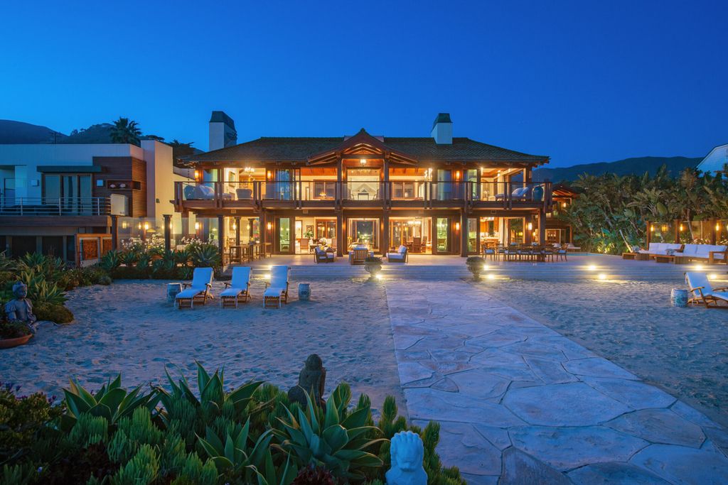 The Malibu Mansion is a Thai-inspired oasis on a rare parcel of more than one acre with approximately 117 feet of beachfront now available for sale. This home located at 31118 Broad Beach Rd, Malibu, California; offering 5 bedrooms and 14 bathrooms with over 17,000 square feet of living spaces.