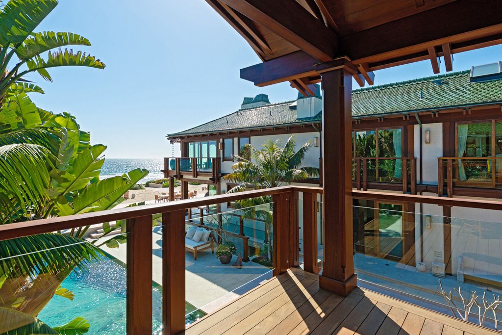 The Malibu Mansion is a Thai-inspired oasis on a rare parcel of more than one acre with approximately 117 feet of beachfront now available for sale. This home located at 31118 Broad Beach Rd, Malibu, California; offering 5 bedrooms and 14 bathrooms with over 17,000 square feet of living spaces.