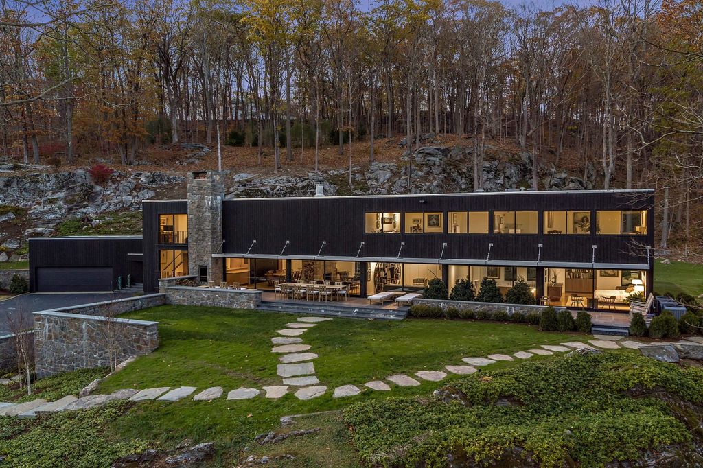 The Contemporary Home in Bedford perfectly sited on over 5 private, tranquil acres with sweeping drive and gated entry now available for sale. This home located at 147 Mianus River Rd, Bedford, New York; offering 5 bedrooms and 5 bathrooms with over 3,900 square feet of living spaces.