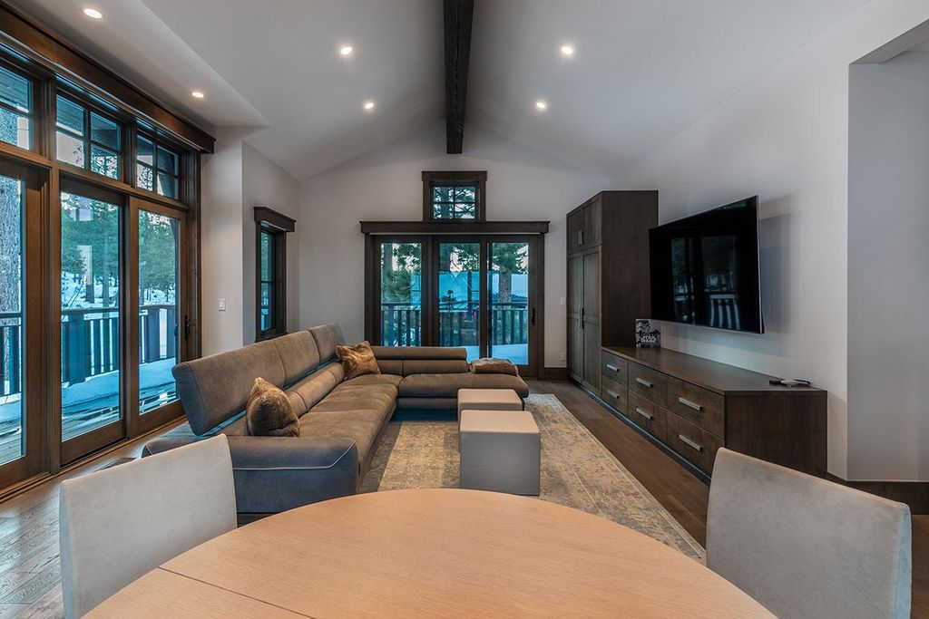 The Martis Camp Home holds views that gaze up toward Lookout Mountain as well as towering windows that frame the Carson Range now available for sale. This home located at 9512 Dunsmuir Way, Truckee, California; offering 5 bedrooms and 6 bathrooms with over 4,400 square feet of living spaces. 