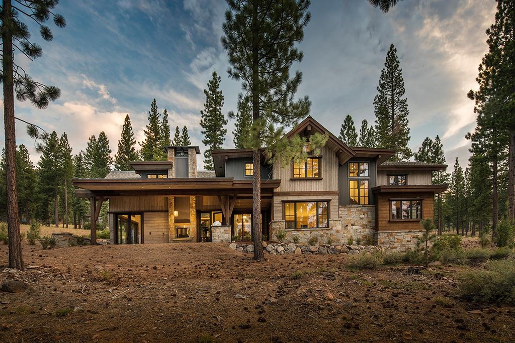 The Martis Camp Home holds views that gaze up toward Lookout Mountain as well as towering windows that frame the Carson Range now available for sale. This home located at 9512 Dunsmuir Way, Truckee, California; offering 5 bedrooms and 6 bathrooms with over 4,400 square feet of living spaces. 