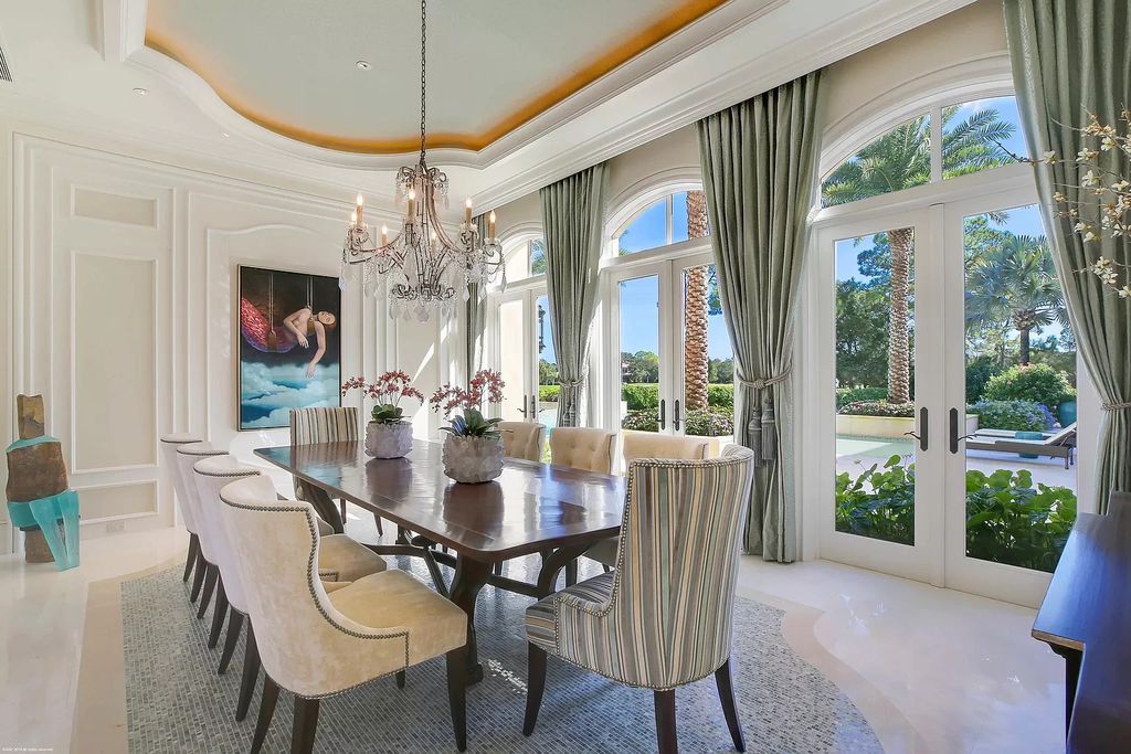 The Custom Home in Florida is a luxurious estate situated on the finest lot in prestigious Old Palm now available for sale. This home located at 11748 Bella Donna Ct, Palm Beach Gardens, Florida; offering 6 bedrooms and 9 bathrooms with over 10,000 square feet of living spaces.