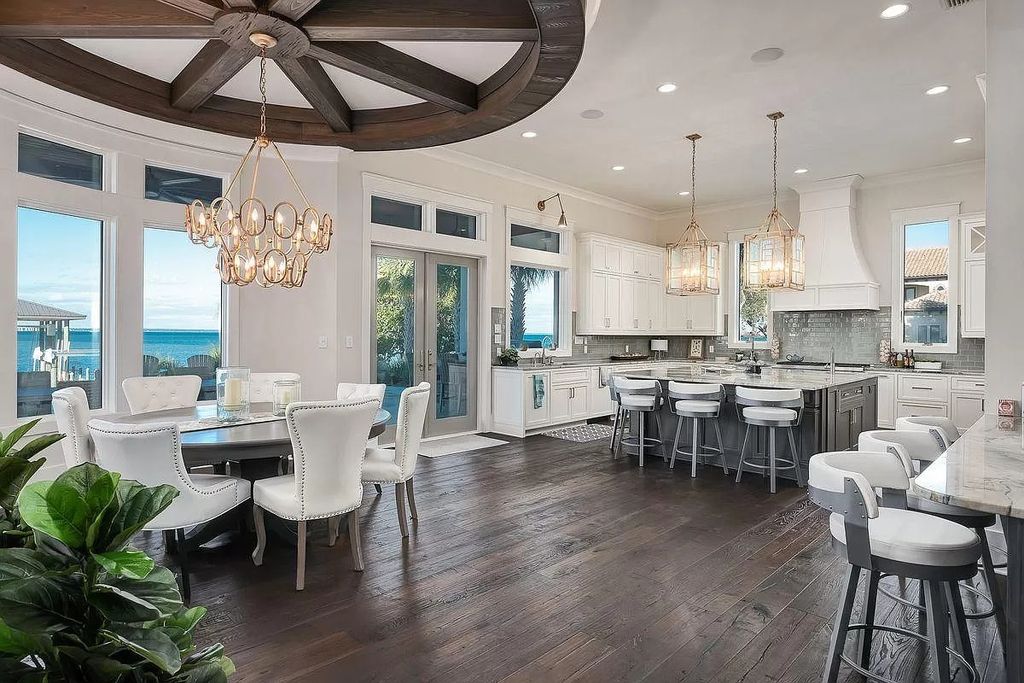 The Florida Retreat is a sprawling bay front home on premier homesites in the prestigious gated enclave of Regatta Bay now available for sale. This home located at 4532 Fairwind Ct, Destin, Florida; offering 4 bedrooms and 6 bathrooms with over 5,700 square feet of living spaces.