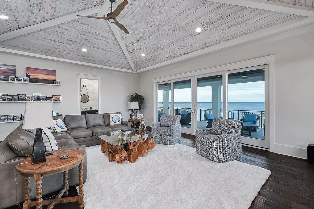 The Florida Retreat is a sprawling bay front home on premier homesites in the prestigious gated enclave of Regatta Bay now available for sale. This home located at 4532 Fairwind Ct, Destin, Florida; offering 4 bedrooms and 6 bathrooms with over 5,700 square feet of living spaces.