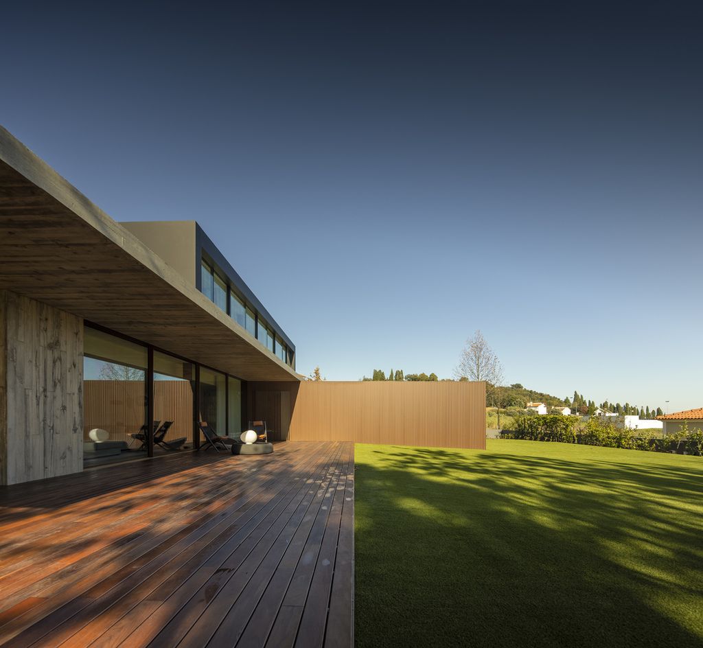 Masterful RCR House in Portugal was designed by Visioarq Arquitectos in contemporary style with concept of balance and contemplation; The spaces developed to create constant and distinct relationships between interior and exterior, with light entering where they merge.