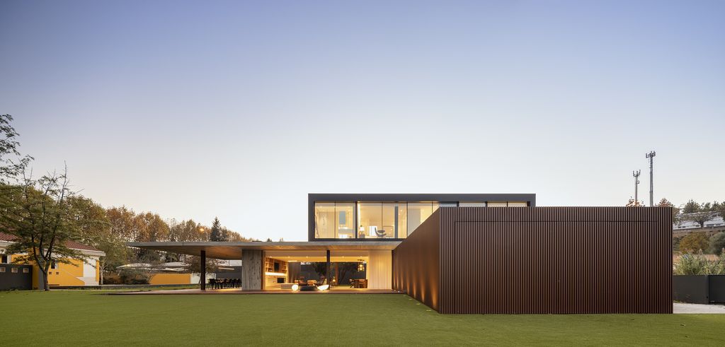 Masterful RCR House in Portugal was designed by Visioarq Arquitectos in contemporary style with concept of balance and contemplation; The spaces developed to create constant and distinct relationships between interior and exterior, with light entering where they merge.