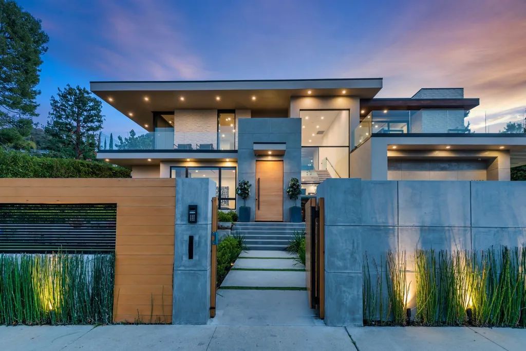 The Encino Home is a modern masterpiece in Royal Hills, sitting on a cul-de-sac with valley views now available for sale. This home located at 16102 Sandy Ln, Encino, California; offering 5 bedrooms and 6 bathrooms with over 5,300 square feet of living spaces.