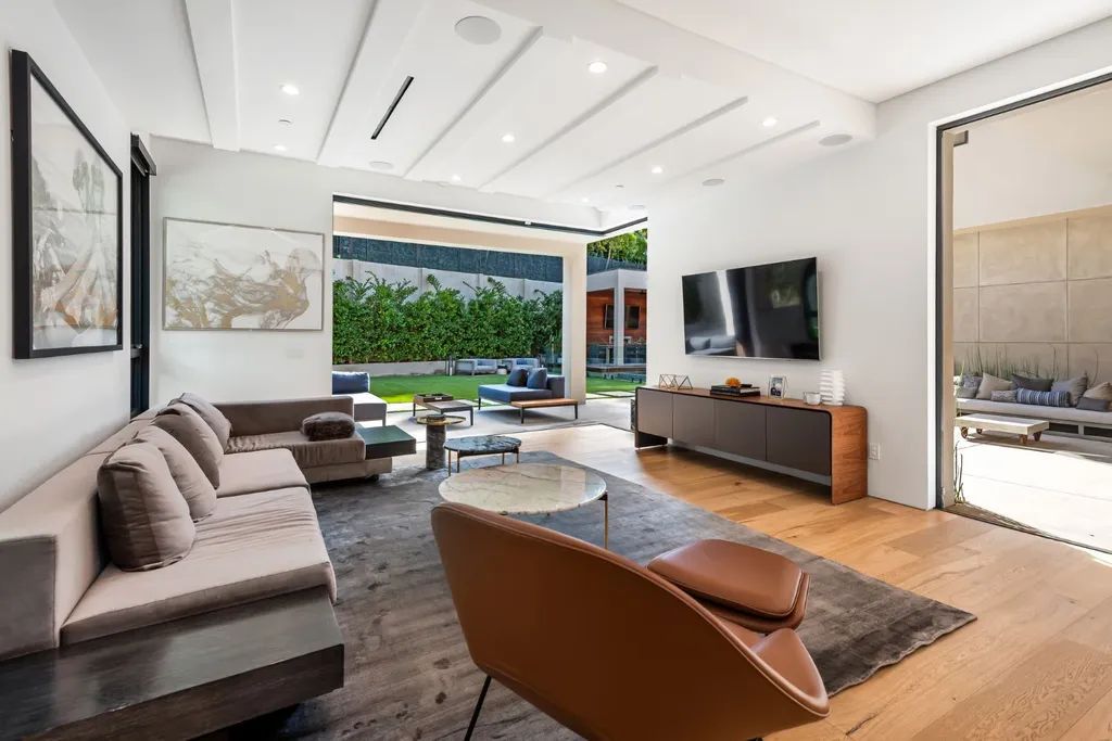 The Encino Home is a modern masterpiece in Royal Hills, sitting on a cul-de-sac with valley views now available for sale. This home located at 16102 Sandy Ln, Encino, California; offering 5 bedrooms and 6 bathrooms with over 5,300 square feet of living spaces.