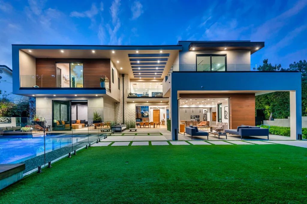 The Encino Home is a modern masterpiece in Royal Hills, sitting on a cul-de-sac with valley views now available for sale. This home located at 16102 Sandy Ln, Encino, California; offering 5 bedrooms and 6 bathrooms with over 5,300 square feet of living spaces.