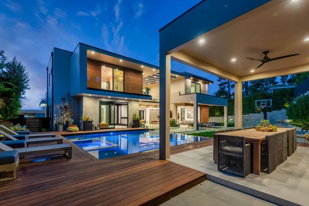 The Encino Home is a modern masterpiece in Royal Hills, sitting on a cul-de-sac with valley views now available for sale. This home located at 16102 Sandy Ln, Encino, California; offering 5 bedrooms and 6 bathrooms with over 5,300 square feet of living spaces.