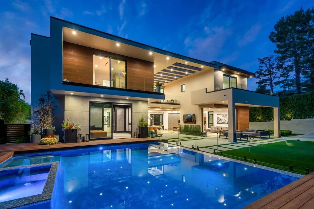 The Encino Home is a modern masterpiece in Royal Hills, sitting on a cul-de-sac with valley views now available for sale. This home located at 16102 Sandy Ln, Encino, California; offering 5 bedrooms and 6 bathrooms with over 5,300 square feet of living spaces.