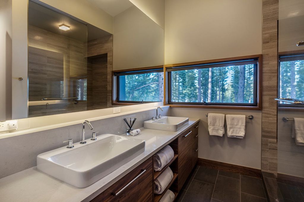 The Martis Camp Home is simultaneously airy and wide open while also being peaceful and private now available for sale. This home located at 8378 Thunderbird Cir, Truckee, California; offering 5 bedrooms and 4 bathrooms with over 3,200 square feet of living spaces.