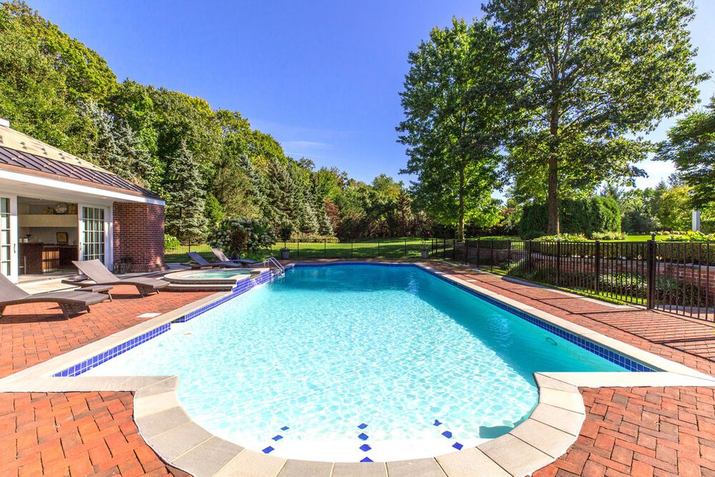 The New York Home is a perfectly manicured property located on one of the most prestigious streets on the Gold Coast of Long Island now available for sale. This home located at 110 Dupont Ests, Greenvale, New York; offering 7 bedrooms and 12 bathrooms with over 10,000 square feet of living spaces. 