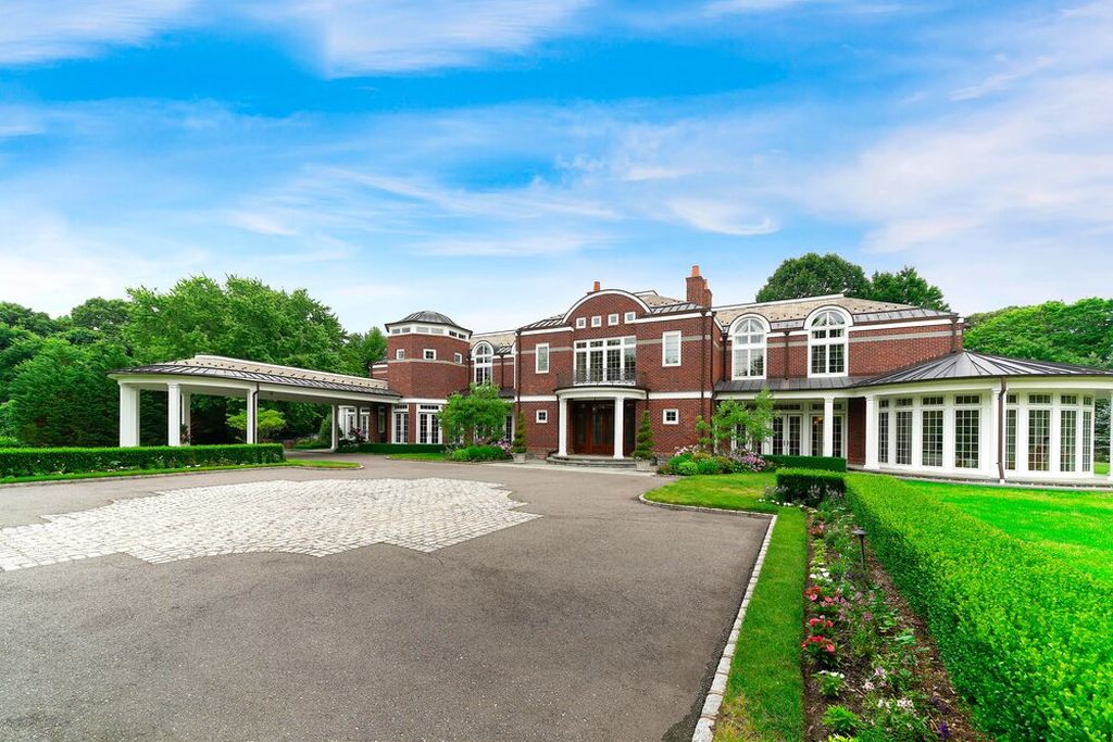 The New York Home is a perfectly manicured property located on one of the most prestigious streets on the Gold Coast of Long Island now available for sale. This home located at 110 Dupont Ests, Greenvale, New York; offering 7 bedrooms and 12 bathrooms with over 10,000 square feet of living spaces. 