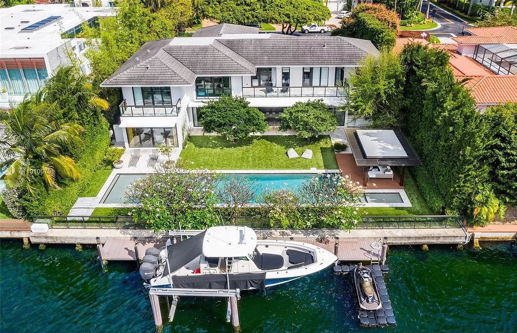 The Waterfront Home is a 2-story masterpiece boasts on Intracoastal waterway with natural luxurious finishes now available for sale. This home located at 610 N Island Rd, North Miami Beach, Florida; offering 6 bedrooms and 7 bathrooms with over 7,200 square feet of living spaces.