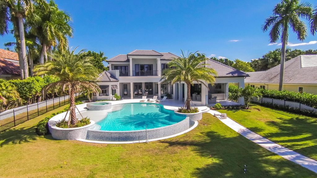 The Naples Home is a classical, lightly lived-in estate with extensive outdoor patios and landscaping finish off the tropical exterior now available for sale. This home located at 1200 Galleon Dr, Naples, Florida; offering 6 bedrooms and 12 bathrooms with over 7,700 square feet of living spaces