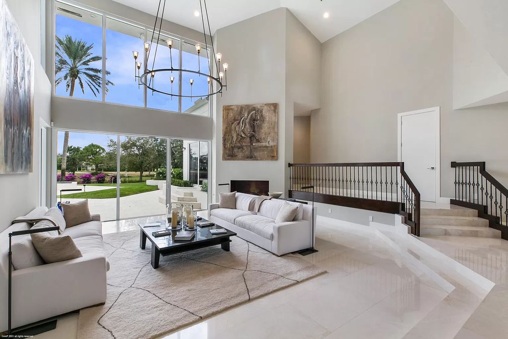 The Contemporary Home is a Beautifully remodeled 2 story home in Palm Beach Polo in relaxed elegance now available for sale. This home located at 2771 Long Meadow Dr, Wellington, Florida; offering 6 bedrooms and 7 bathrooms with over 8,300 square feet of living spaces.
