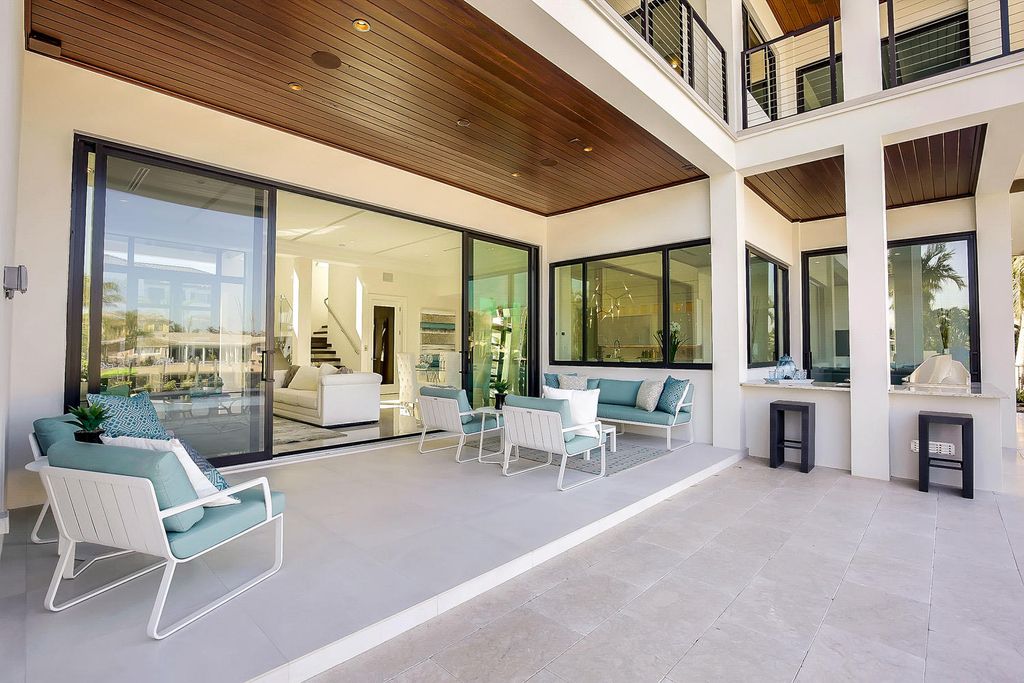 The Florida Waterfront Home is an exceptional estate with immaculate contemporary finishes designed by Zahn Builders now available for sale. This home located at 2431 NE 32nd Ct, Lighthouse Point, Florida; offering 5 bedrooms and 6 bathrooms with over 5,600 square feet of living spaces.