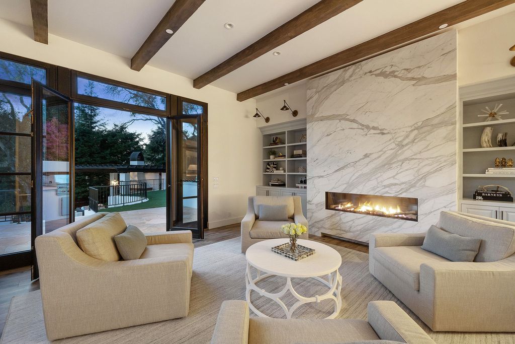 The Contemporary Mediterranean Villa in Kentfield is a luxurious residence offers high ceilings, a clean interior, and views now available for sale. This home located at 1 Hotaling Ct, Kentfield, California; offering 6 bedrooms and 5 bathrooms with over 6,000 square feet of living spaces.
