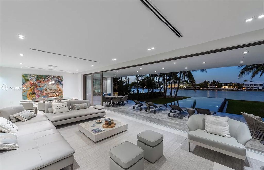 The Waterfront Home in Miami Beach is a new construction masterpiece located in gated community of Normandy Shores now available for sale. This home located at 305 N Shore Dr, Miami Beach, Florida; offering 5 bedrooms and 8 bathrooms with over 5,233 square feet of living spaces.