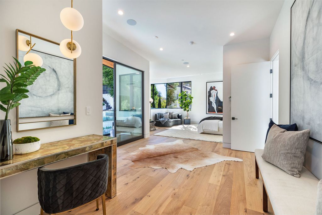 The Beverly Hills Home is a magnificent newly completed architectural residence with great volume and scale now available for sale. This home located at 2220 Coldwater Canyon Dr, Beverly Hills, California; offering 4 bedrooms and 5 bathrooms with over 4,200 square feet of living spaces.