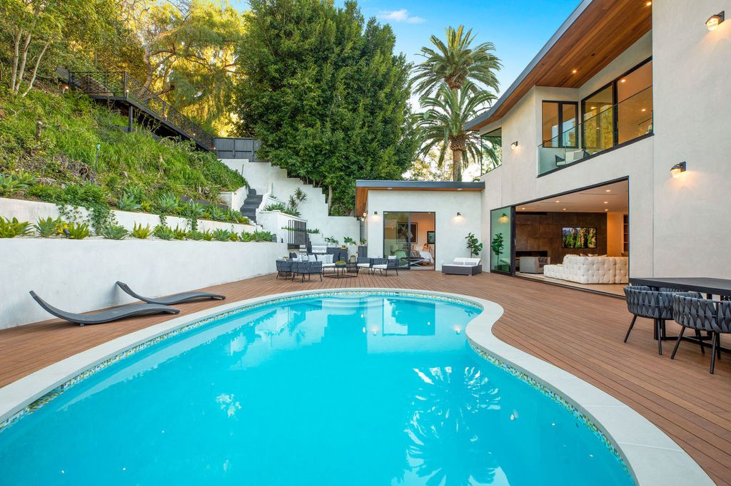 The Beverly Hills Home is a magnificent newly completed architectural residence with great volume and scale now available for sale. This home located at 2220 Coldwater Canyon Dr, Beverly Hills, California; offering 4 bedrooms and 5 bathrooms with over 4,200 square feet of living spaces.