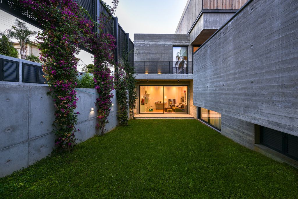 Concrete House in Cyprus was designed by Markella Menikou Chartered Architect in contemporary style with seamless extension to the outside; this house offers modern living with high end finishes and smart amenities. 