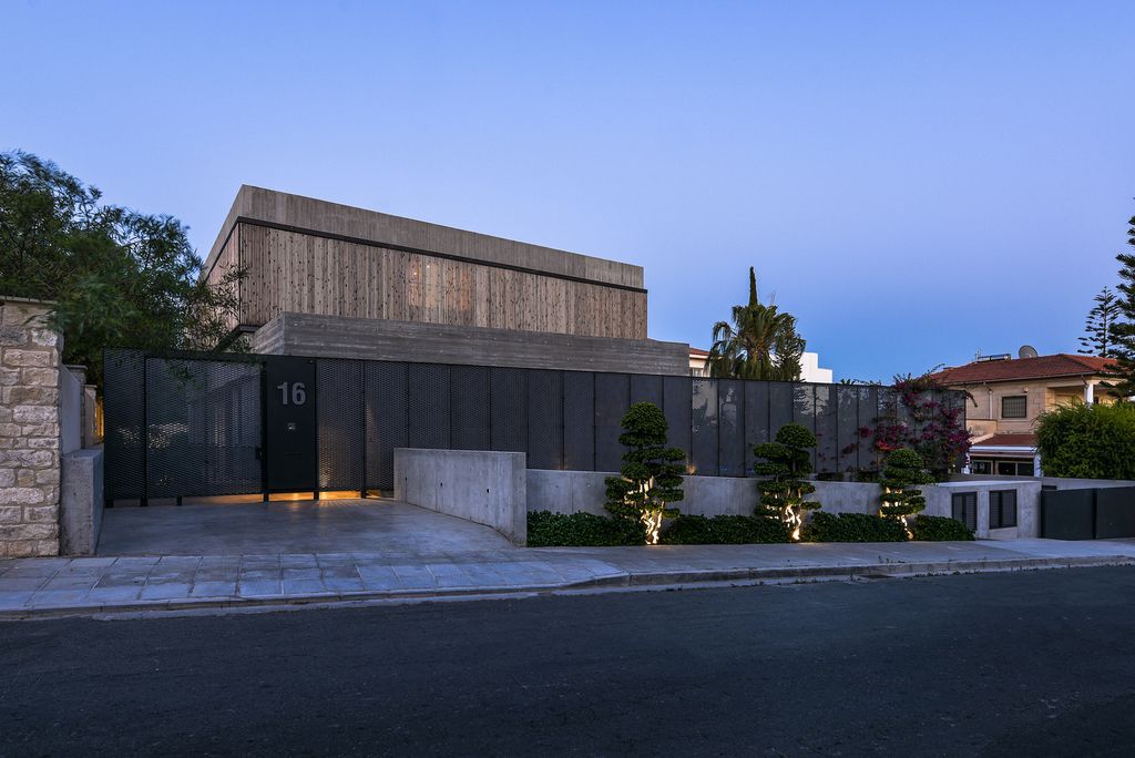 Concrete House in Cyprus was designed by Markella Menikou Chartered Architect in contemporary style with seamless extension to the outside; this house offers modern living with high end finishes and smart amenities. 