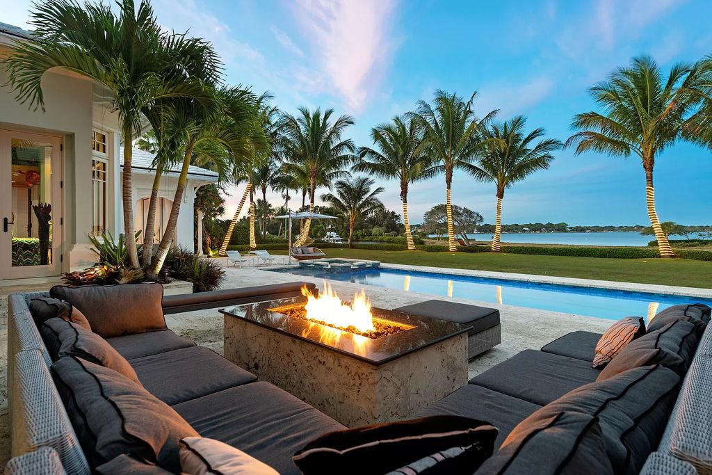 The Waterfront Estate is a Bermuda-Colonial style home has endless wide-water views of the St. Lucie River and Inlet now available for sale. This home located at 3015 SE Saint Lucie Blvd, Stuart, Florida; offering 4 bedrooms and 7 bathrooms with over 7,700 square feet of living spaces.