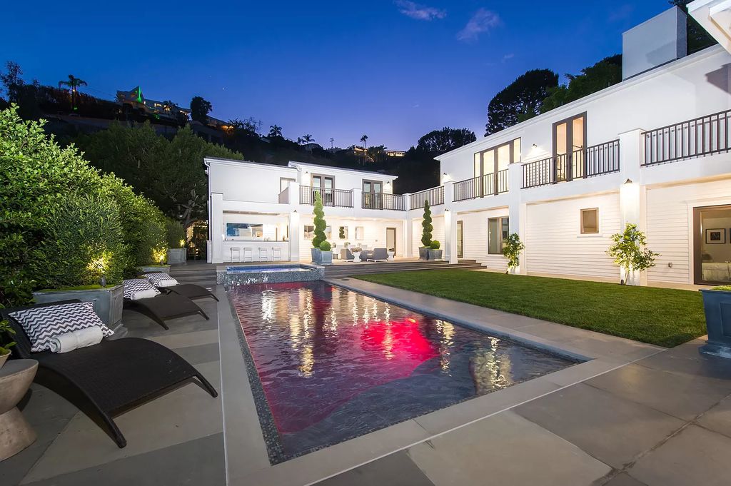 The Contemporary Home is a stylish and sophisticated estate provides the perfect combination of indoor and outdoor living now available for sale. This home located at 1387 N Doheny Dr, Los Angeles, California; offering 4 bedrooms and 8 bathrooms with over 7,700 square feet of living spaces.
