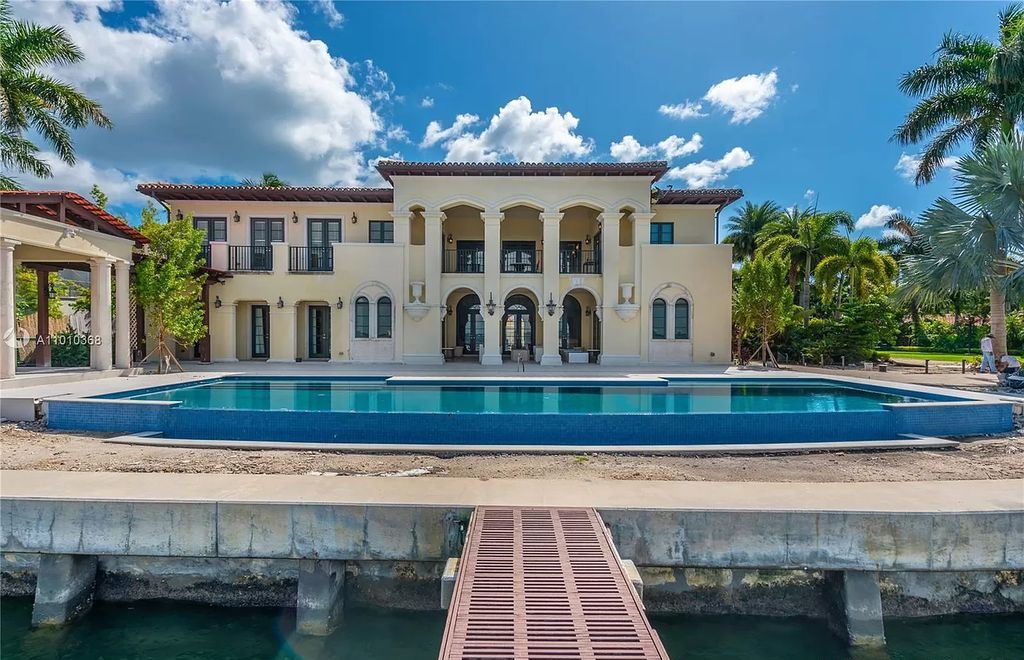 The Miami Beach Mediterranean Home is a luxurious home with the most spectacular sunset views of Downtown Miami on North Bay Road now available for sale. This home located at 4580 N Bay Rd, Miami Beach, Florida; offering 8 bedrooms and 12 bathrooms with over 12,700 square feet of living spaces. 