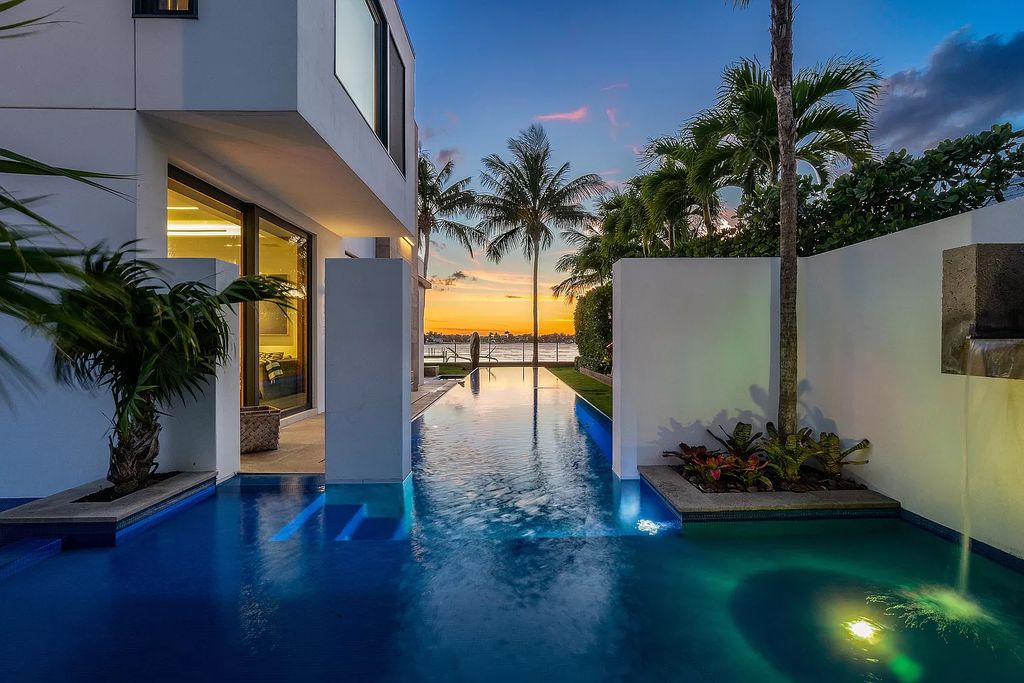 The Home in Palm Beach is a modern architectural symphony with expansive Intracoastal views from every room now available for sale. This home located at 2288 Ibis Isle Rd W, Palm Beach, Florida; offering 5 bedrooms and 5 bathrooms with over 4,800 square feet of living spaces.