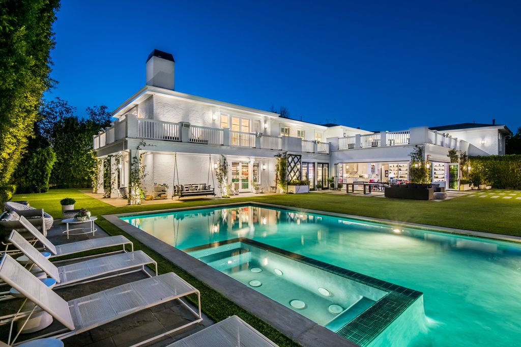 The Encino Estate is a opulent architectural masterpiece tucked behind exclusive private gates now available for sale. This home located at 4848 Encino Ave, Encino, California; offering 7 bedrooms and 9 bathrooms with over 10,500 square feet of living spaces.