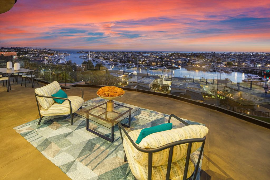 The California Contemporary Home is a luxuriously newly constructed residence with panoramic vistas of Newport Harbor now available for sale. This home located at 1215 Dolphin Ter, Corona Del Mar, California; offering 6 bedrooms and 8 bathrooms with over 7,200 square feet of living spaces.