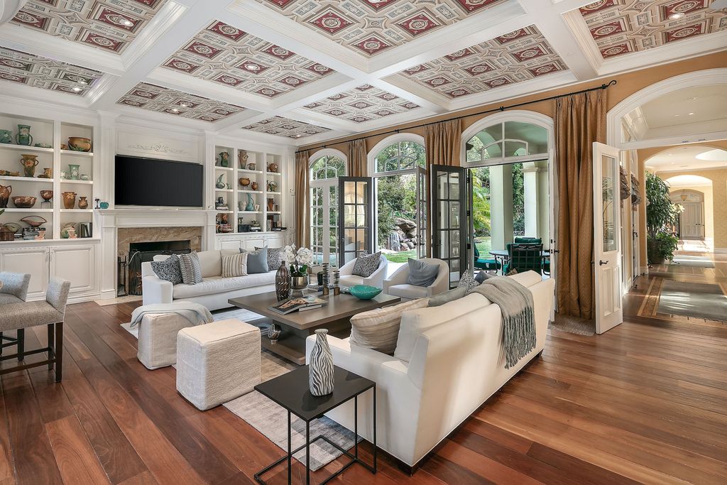 The Beverly Hills Mansion is a palatial estate boasts 13,405 square feet of unmatched scale and style now available for sale. This home located at 2650 Benedict Canyon Dr, Beverly Hills, California; offering 7 bedrooms and 9 bathrooms with over 13,000 square feet of living spaces.