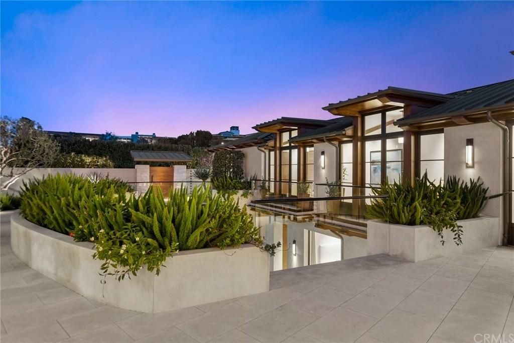 The California Mansion is an architectural masterpiece in the highly exclusive Cameo Shores neighborhood, Corona Del Mar now available for sale. This home located at 4541 Brighton Rd, Corona Del Mar, California; offering 5 bedrooms and 6 bathrooms with over 7,000 square feet of living spaces.