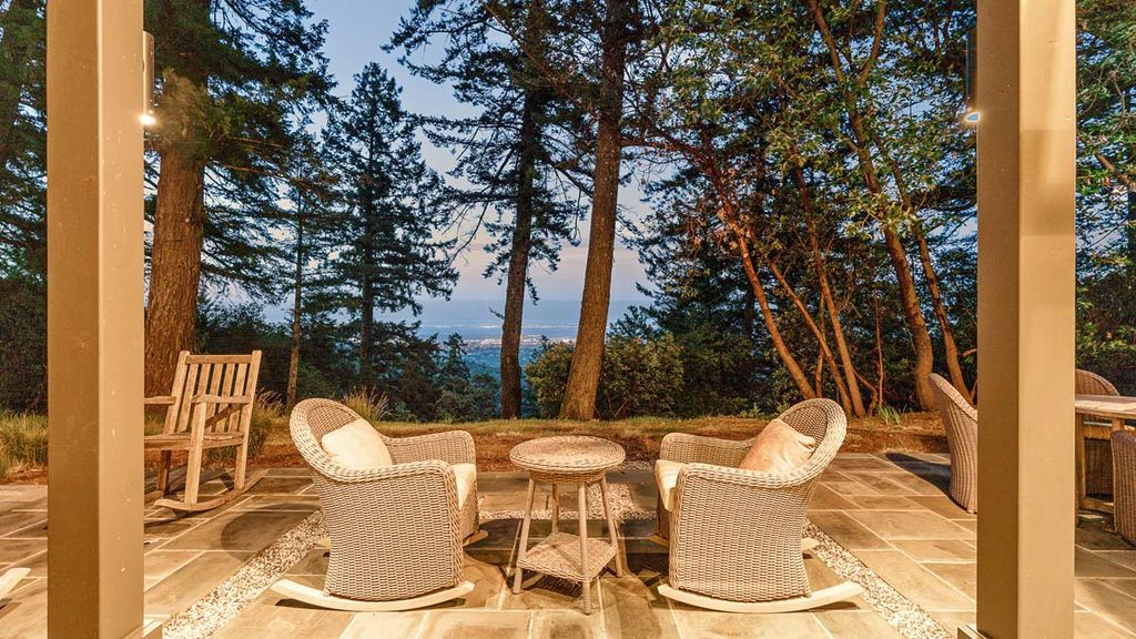 The Architectural Home in Woodside is on a extraordinary setting has a backdrop of dazzling San Francisco Bay views now available for sale. This home located at 1090 Bear Gulch Rd, Woodside, California; offering 3 bedrooms and 4 bathrooms with over 5,400 square feet of living spaces.