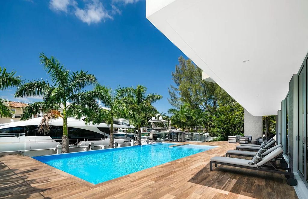 The Home in Miami Beach is a modern masterpiece with only the finest fixtures, finishes, and amenities now available for sale. This home located at 13250 Biscayne Bay Dr, North Miami, Florida; offering 5 bedrooms and 5 bathrooms with over 4,500 square feet of living spaces.