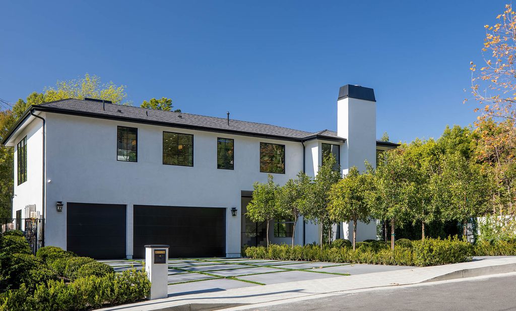 The Beverly Hills Home is a newly re-imagined estate with a sweeping open floor plan in a world class locale now available for sale. This home located at 9607 Wendover Dr, Beverly Hills, California; offering 5 bedrooms and 5 bathrooms with over 5,700 square feet of living spaces.