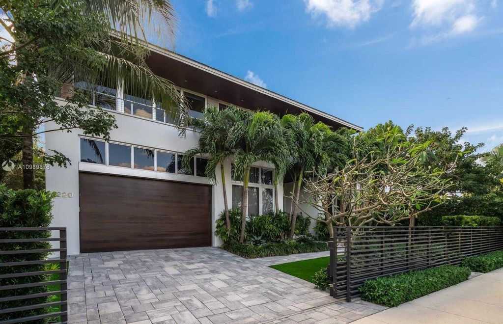 The Miami Beach Villa is a luxurious home perfect for entertaining with large manicured garden and full outdoor kitchen now available for sale. This home located at 1220 S Biscayne Point Rd, Miami Beach, Florida; offering 6 bedrooms and 6 bathrooms with over 5,400 square feet of living spaces.